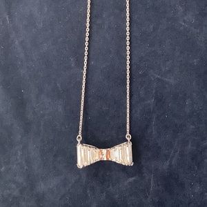 Henri Bendel necklace with a crystal bow,16 inch long, silver finish